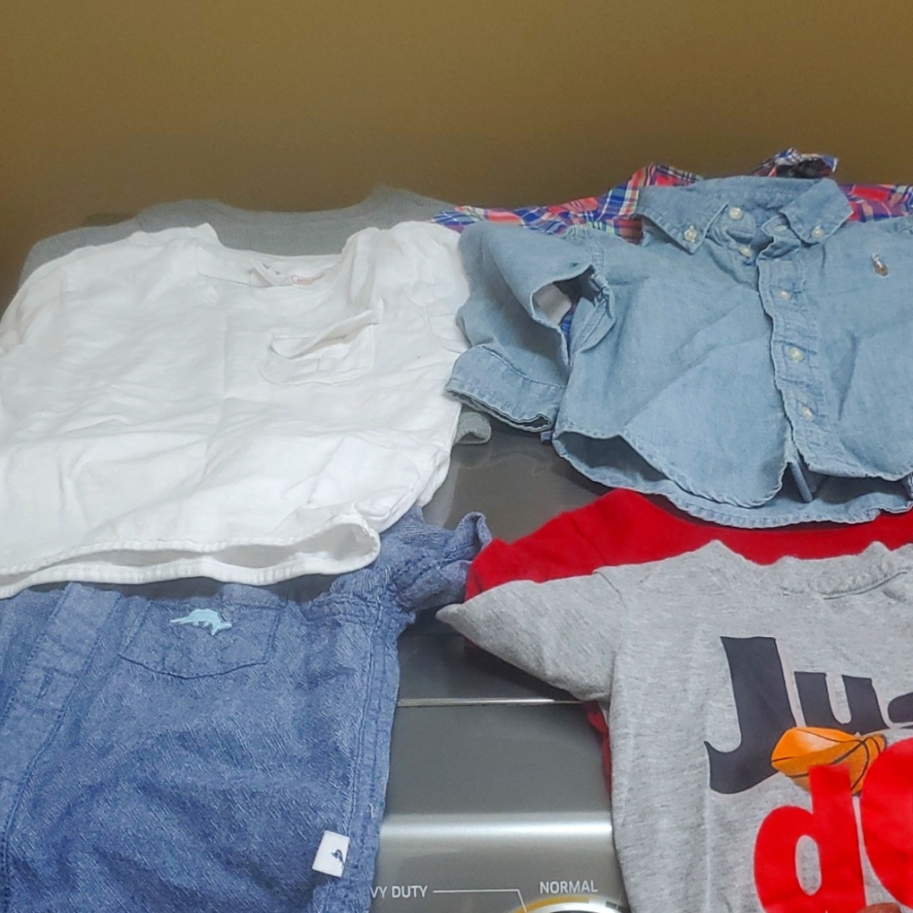 A collection of boys 2T shirts. Long and short sleeves. T-shirt, buttons downs